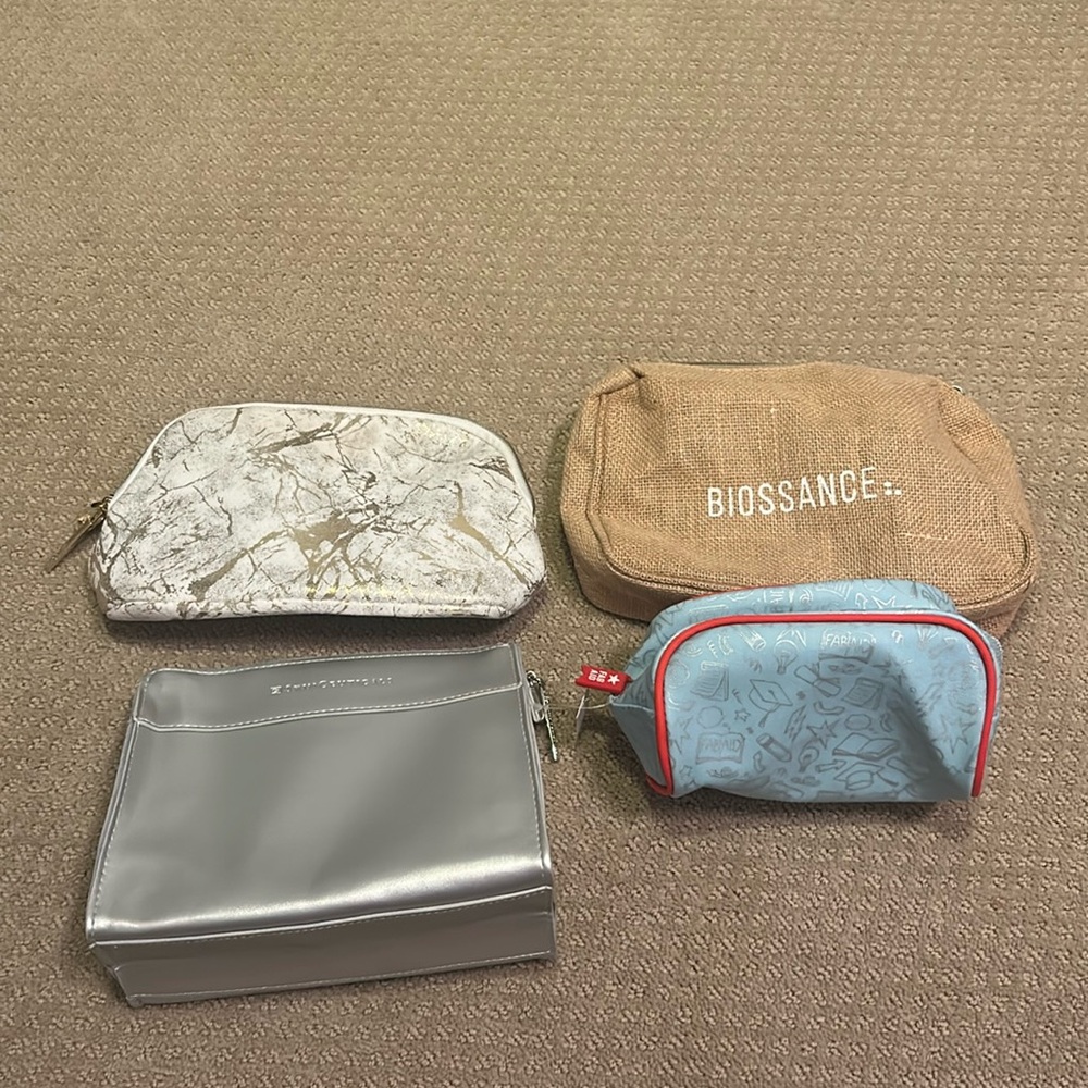 Four Small Bags. New.